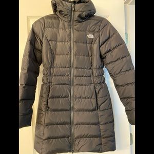 Women’s North Face winter medium length down jacket. Size XS